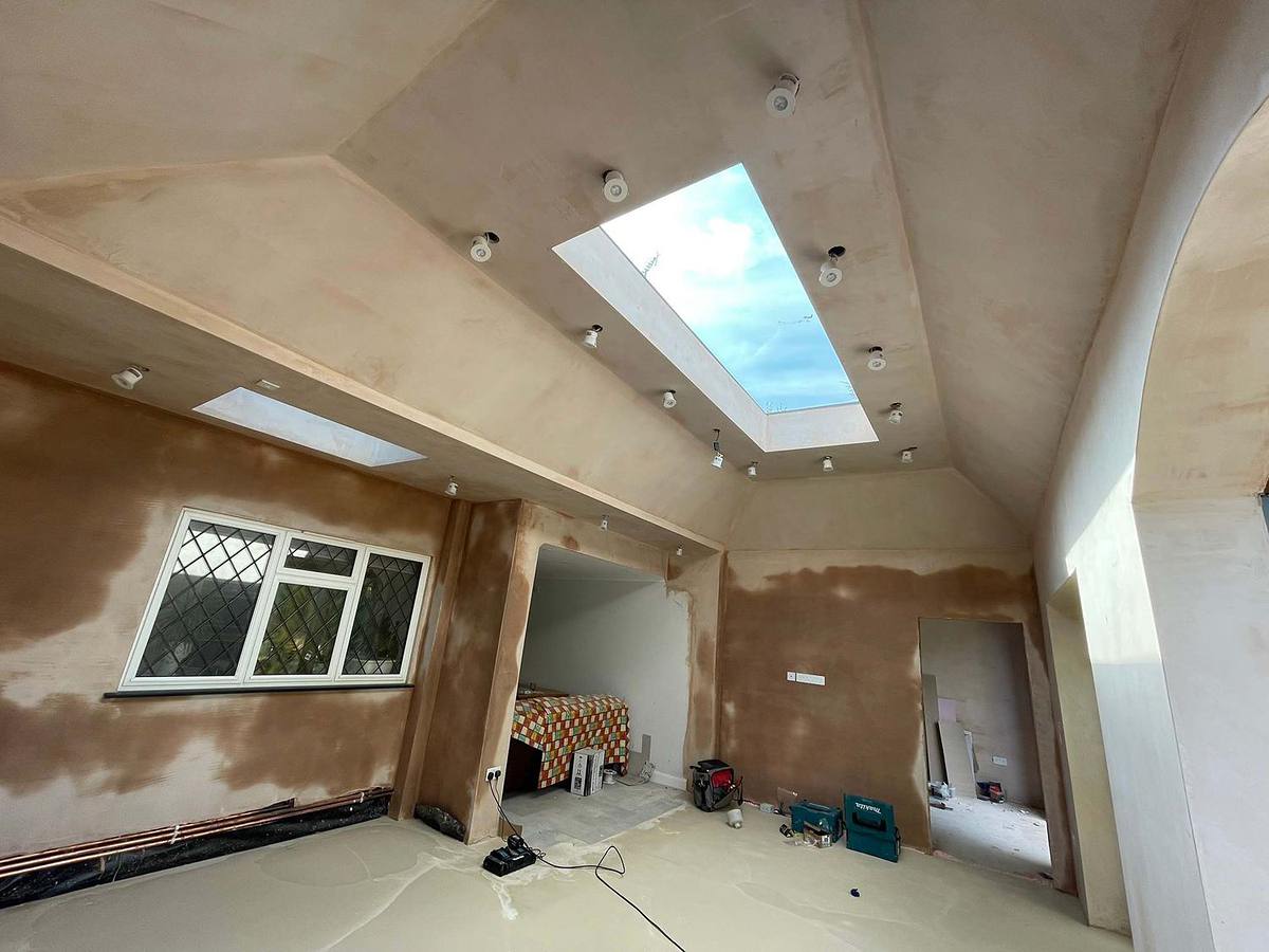 A vaulted loft conversion in Hertfordshire, plastered and ready for decoration
